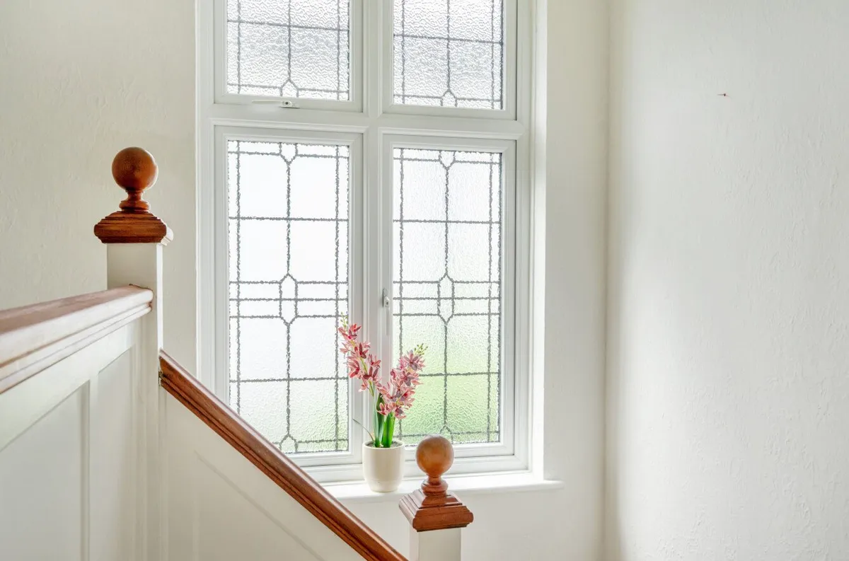 Leaded window on staircase, 1930s detached house Orpington